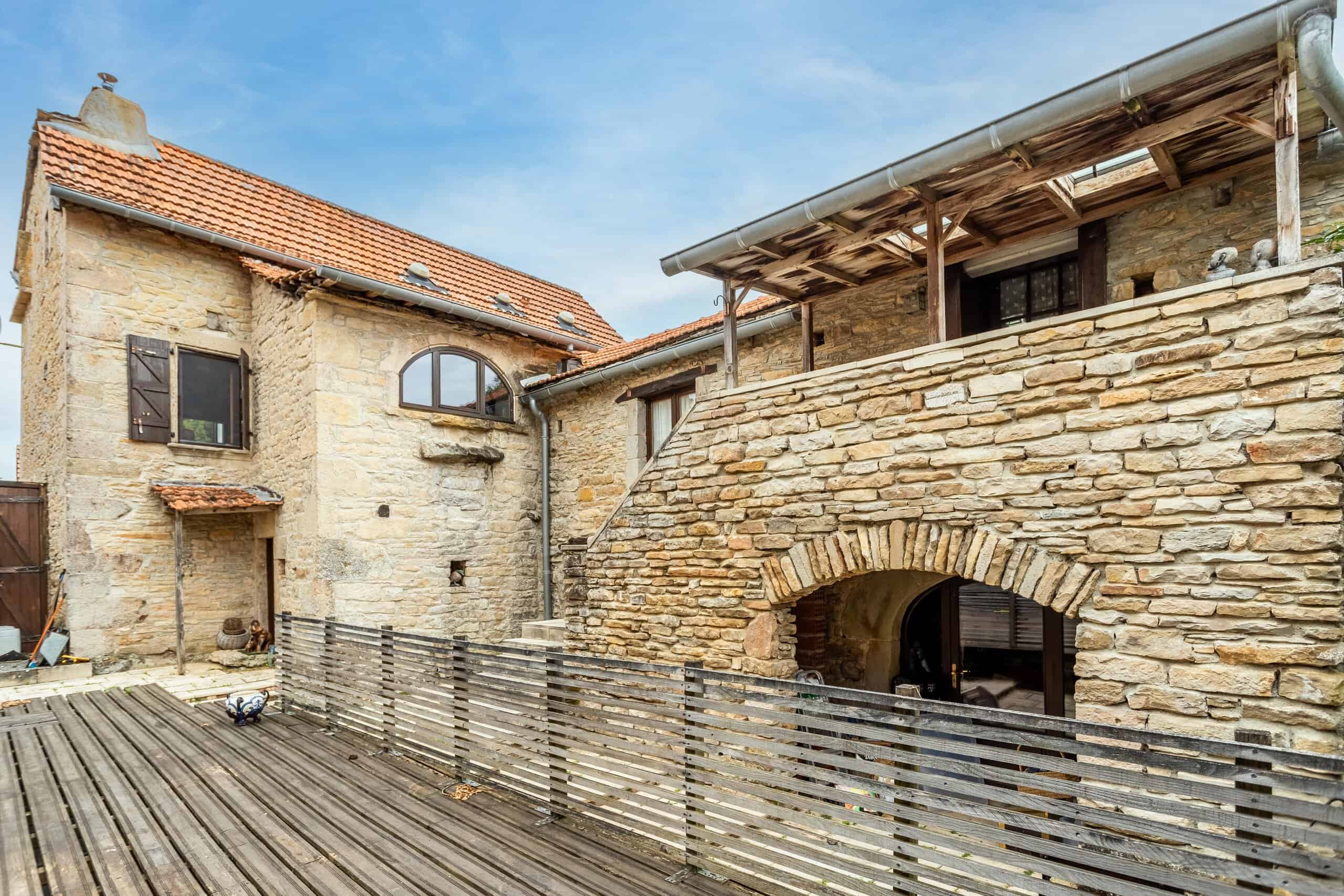 Village house, garage and garden.