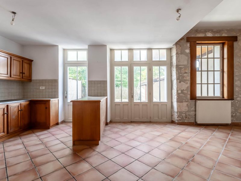 Village house with garage