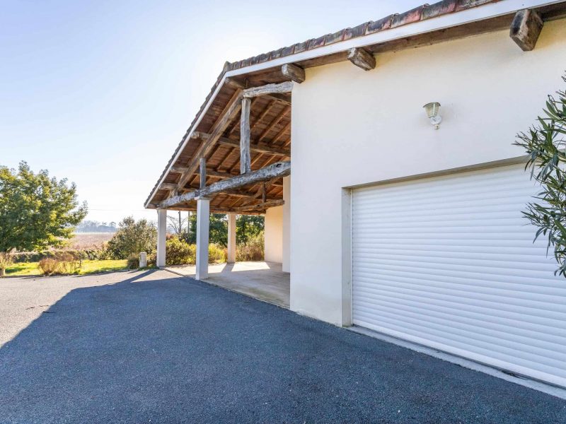 Country property with garage and barn