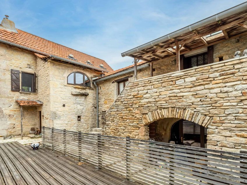 Village house, garage and garden.