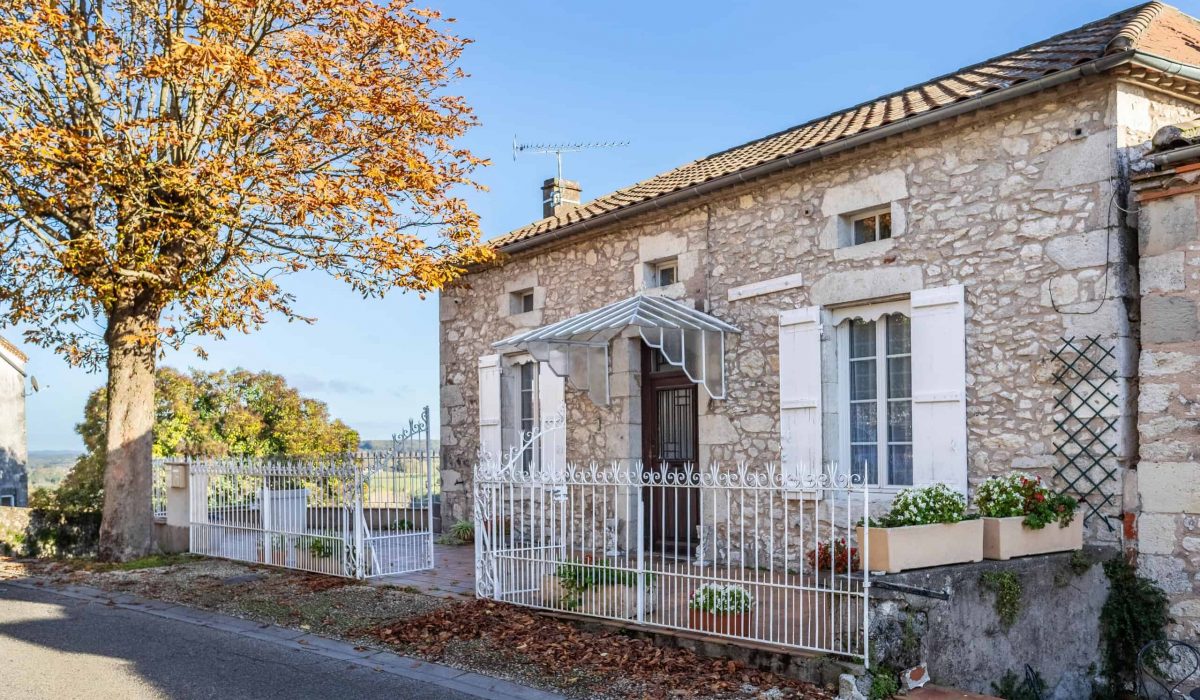 Village house with garden and view