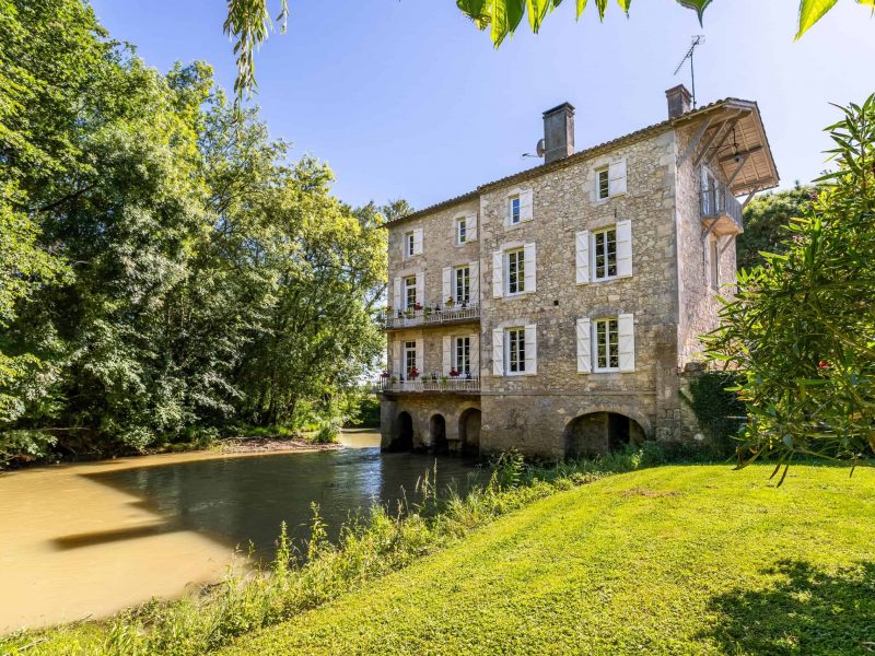 Country mill property with annexe, land and garages